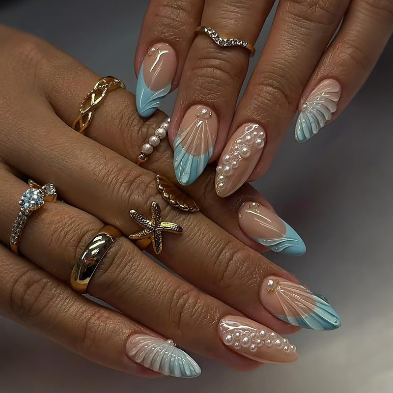 Art nail set with elegant shell and pearl decorations Kalsten