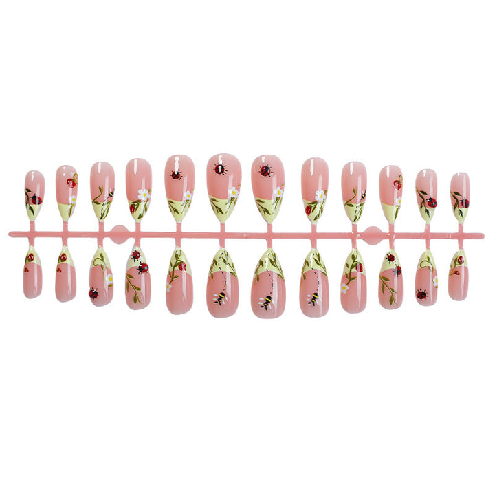 Nail set with floral motifs and glossy accents Kalsten