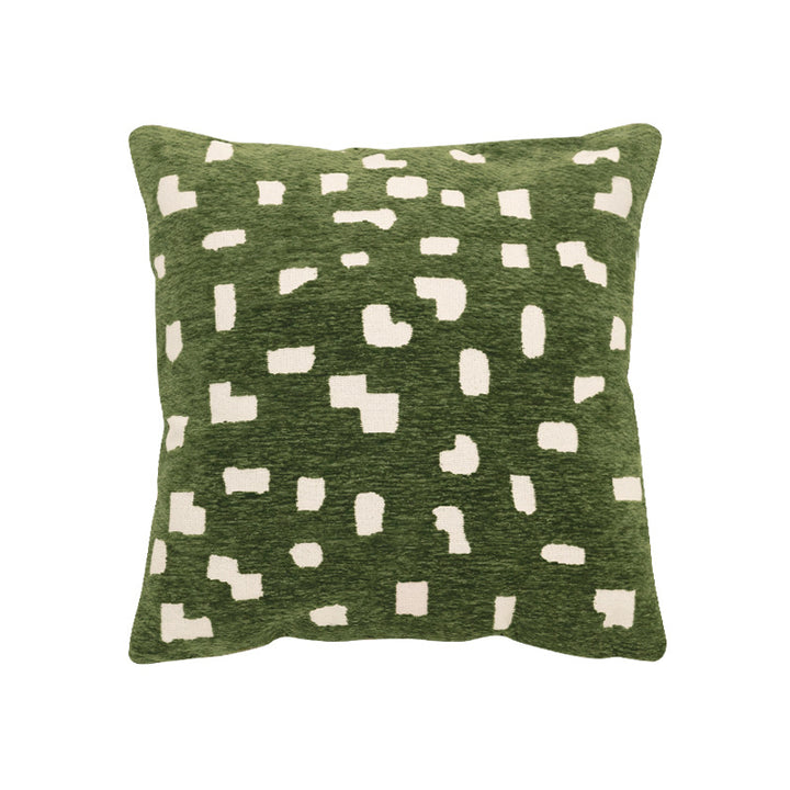 Decorative cushion with abstract pixel pattern and soft bouclé cover