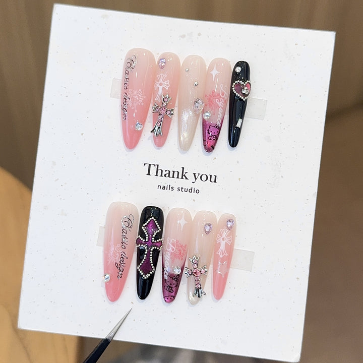 Artificial nails with glamorous accents and sparkling embellishments Kalsten
