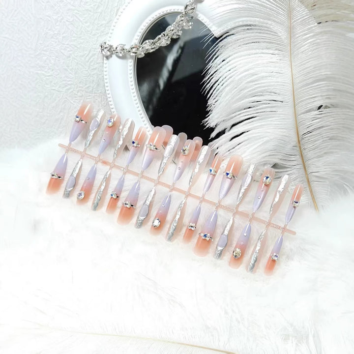 Artificial nails with elegant glitter and crystal accents Kalsten