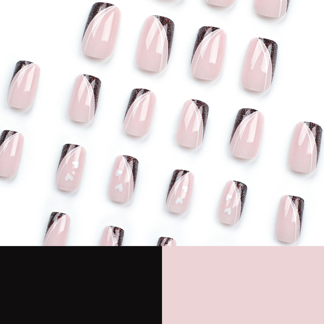Artistic Nail Art with Elegant Glitter and Heart Design Kalsten