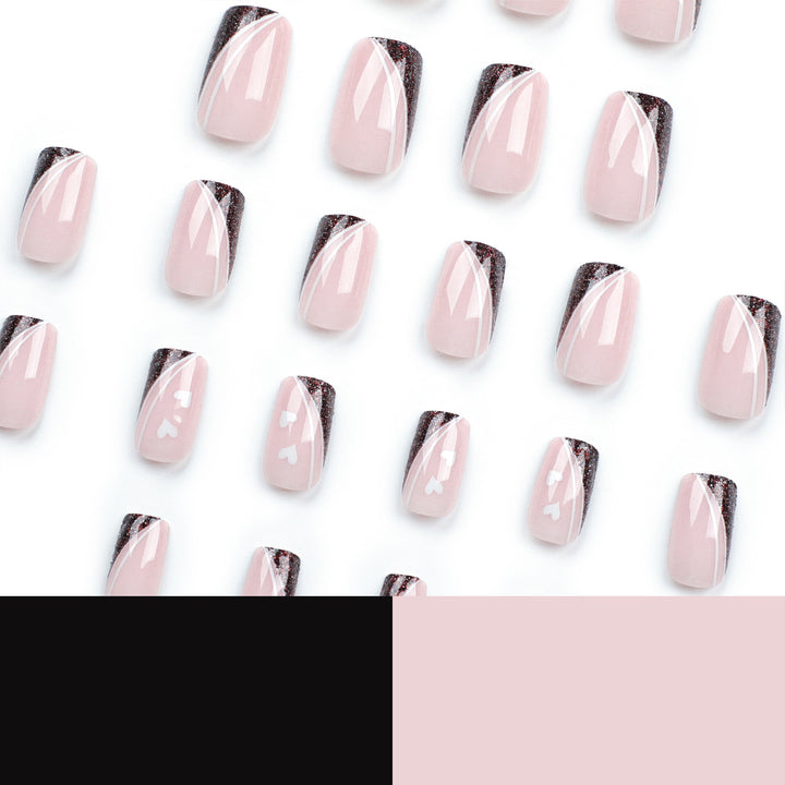 Artistic Nail Art with Elegant Glitter and Heart Design Kalsten