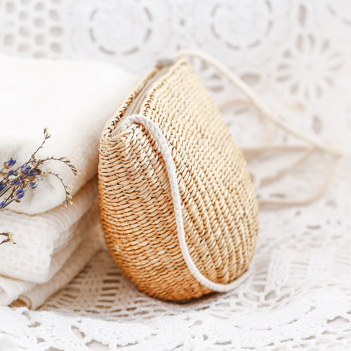 Handcrafted basket bag in unique half-moon design Kalsten