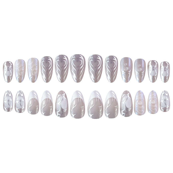 Elegant Stiletto Nail Extensions with Decorative Silver Accents Kalsten