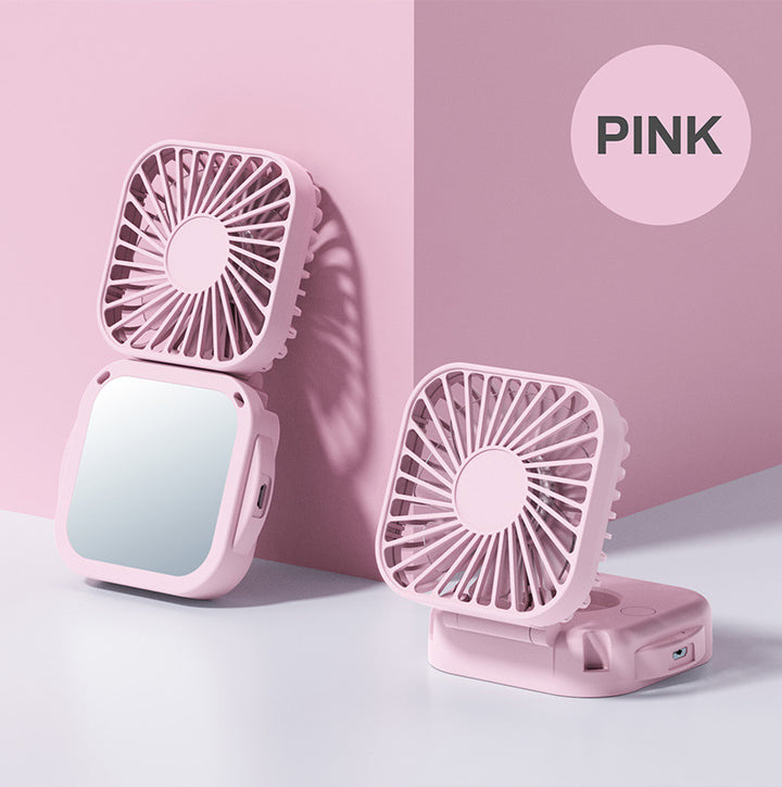 Unisex nan compact foldable clip on handheld desk fan with built in mirror adjustable tilt and USB rechargeable battery Kalsten