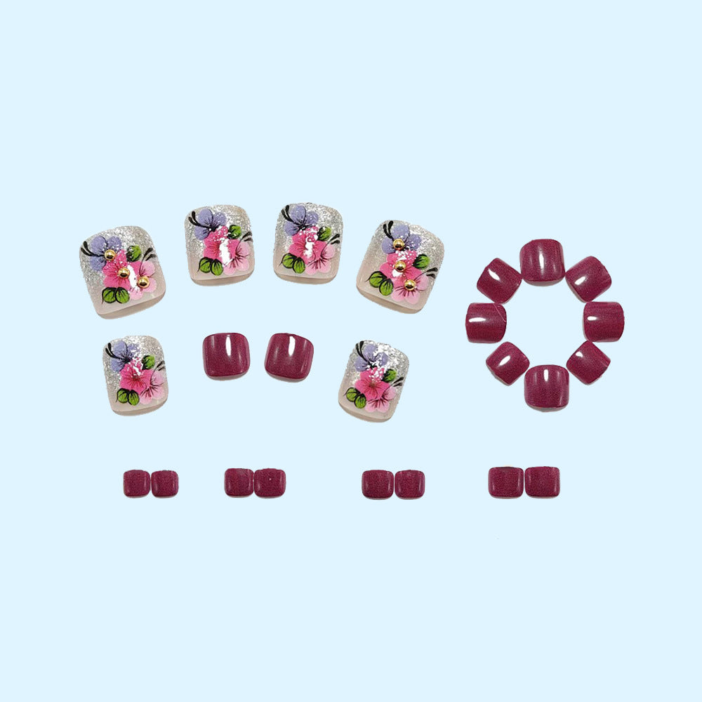 Artificial nails with floral motifs and glitter accents Kalsten