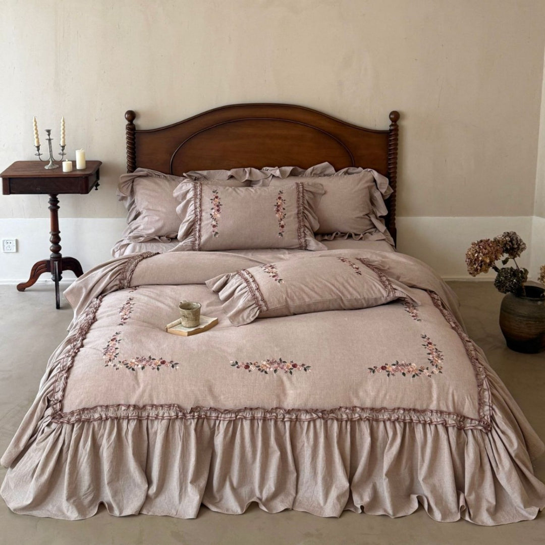 Romantic bedding set with ruffles and floral embroidery in linen look