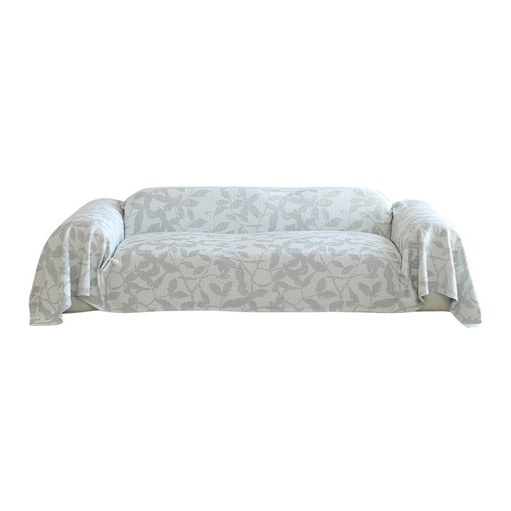Generous sofa cover for 3-seater with floral jacquard structure