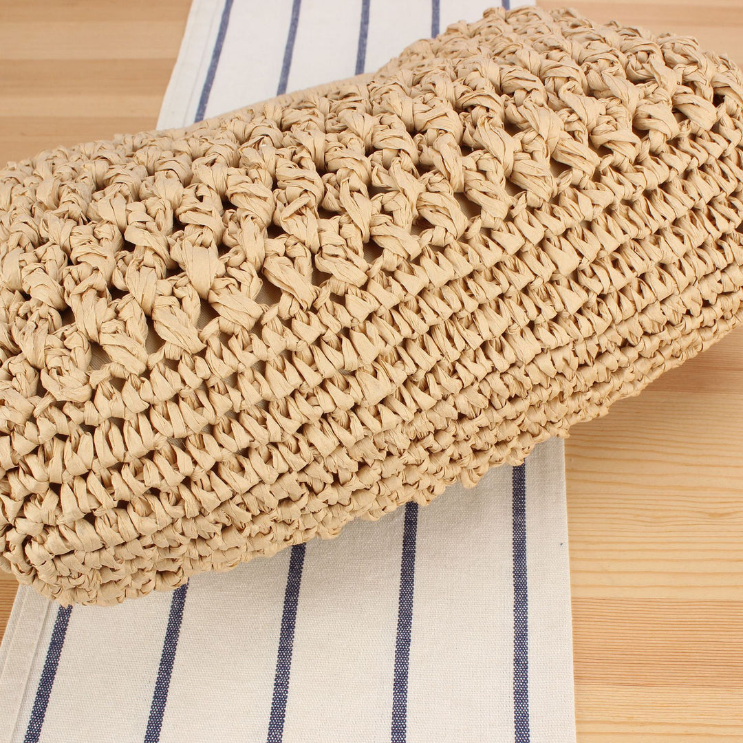 Handbag made of naturally untreated woven material with elegant chain embellishment Kalsten