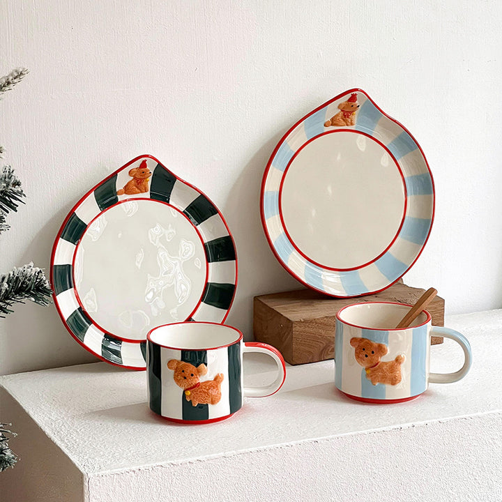 Ceramic cup set with saucer, hand-painted dog motif and wooden spoon