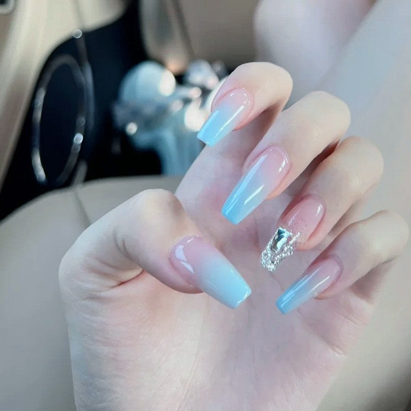 Nail set with elegant ombre and glitter accents Kalsten