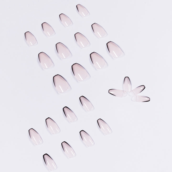 Artful stiletto nails with elegant black tip decoration Kalsten