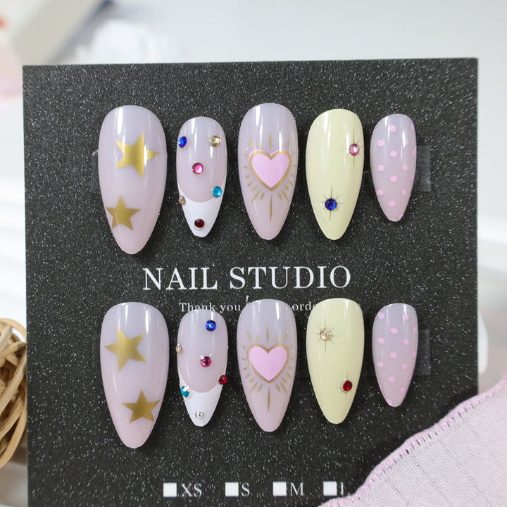 Acrylic nail set with stylish heart and star designs Kalsten