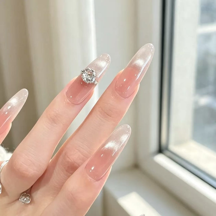 Elegant Stiletto Nail Extensions with Crystal Accent