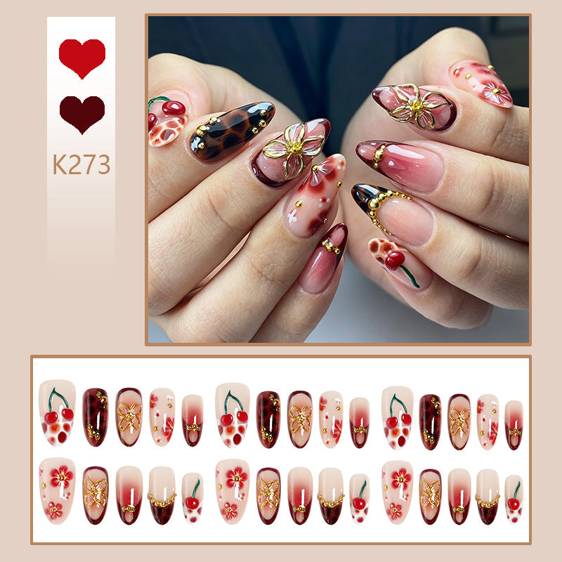 Artful nail tips with cheerful flower and cherry design Kalsten