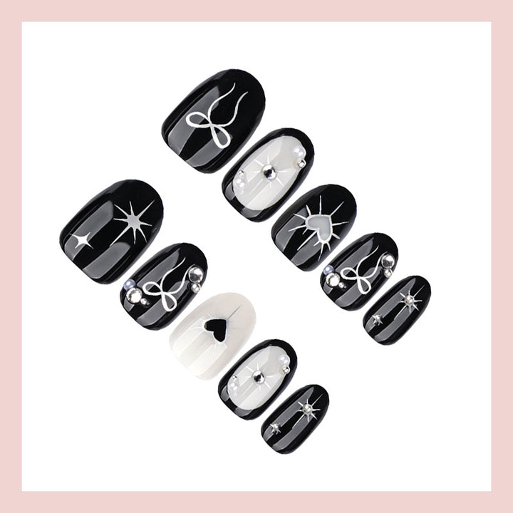 Artificial nail set with elegant bow and heart design Kalsten