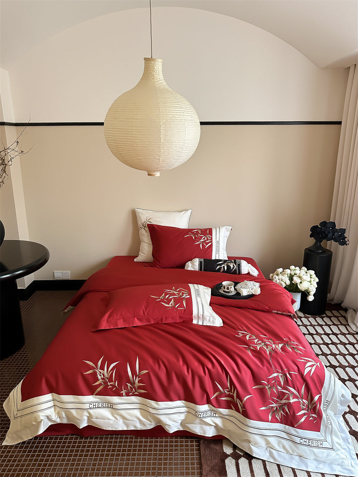 Duvet cover set made of cotton satin with embroidered bamboo motif, fine border & decorative roll cover