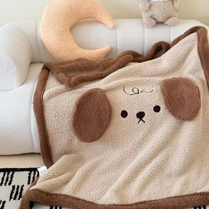 Cuddly Sherpa children's blanket with appliquéd cloud motif and teddy lining