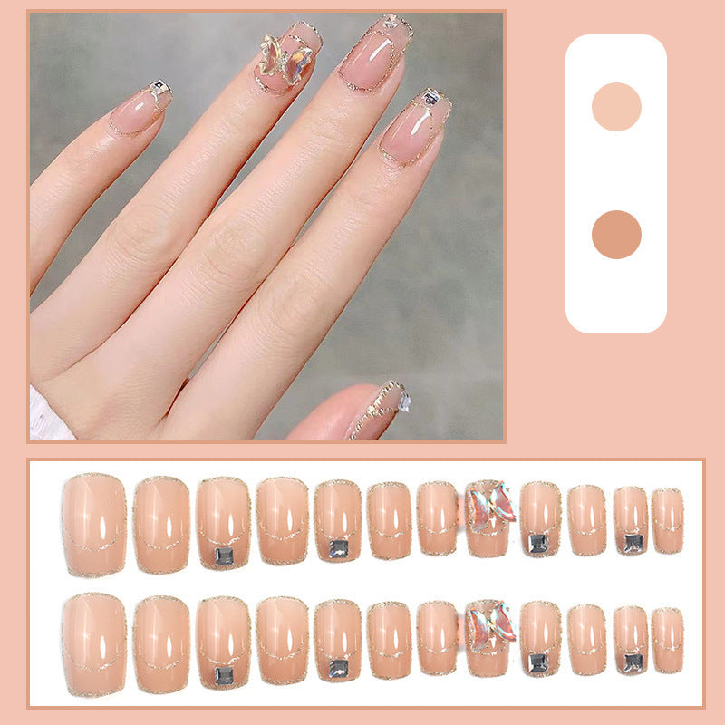 Glamorous artificial nails with delicate rhinestone decorations Kalsten