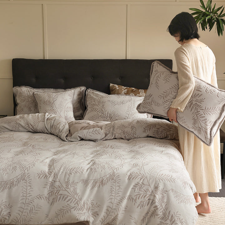 Jacquard bedding set with leaf relief, light quilting, and soft finish