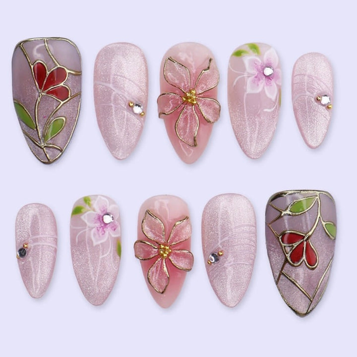 Nail art set with filigree floral decorations and shiny details Kalsten