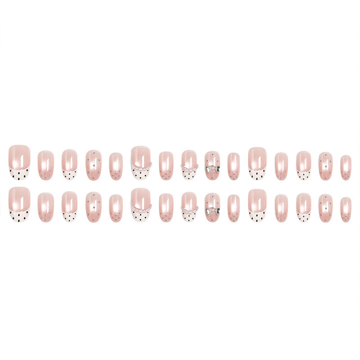 Artificial nail set with elegant French design and delicate pearl embellishments Kalsten