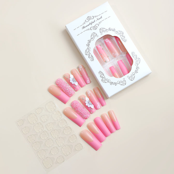 Acrylic nail set with sparkling glitter and delicate flower decorations Kalsten