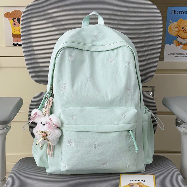 Playful backpack with fine embroidery Kalsten