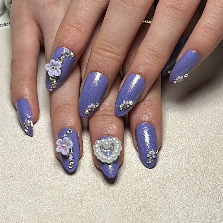 Artistic Nail Art with Floral Decorations Kalsten