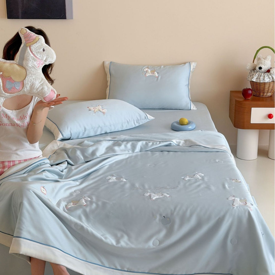 Satin bedding set with embroidered cat appliqués and silky soft finish