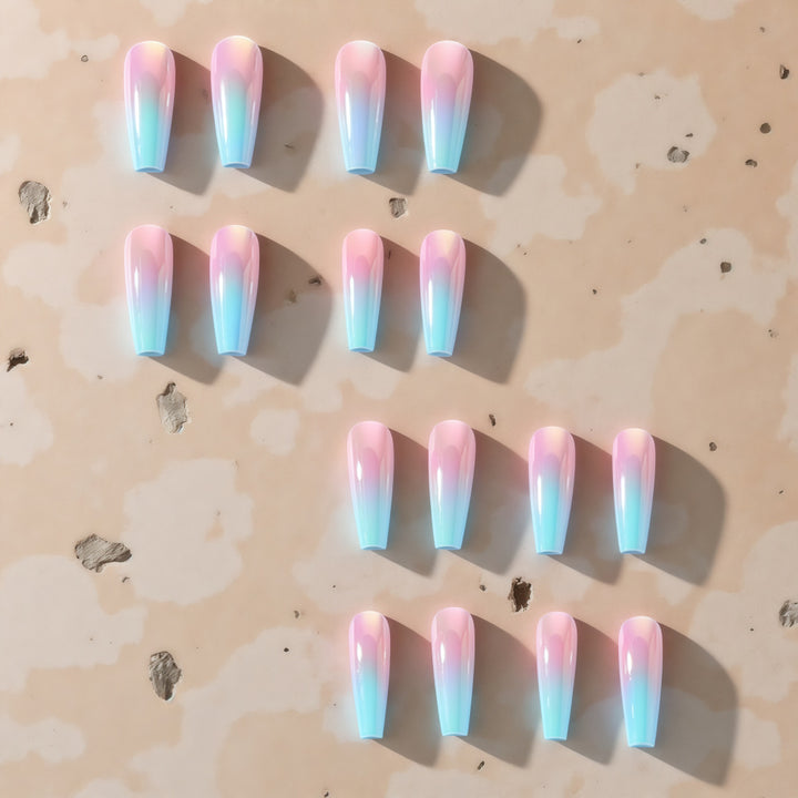 Artificial nails in modern glitter gradient design Kalsten
