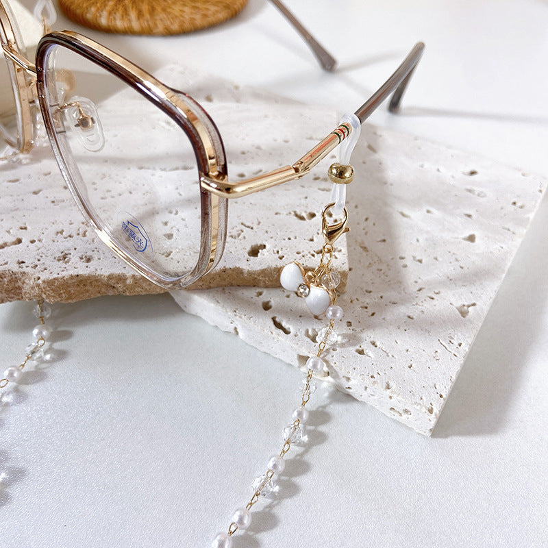 Elegant earrings with pearls and flower pendants Kalsten