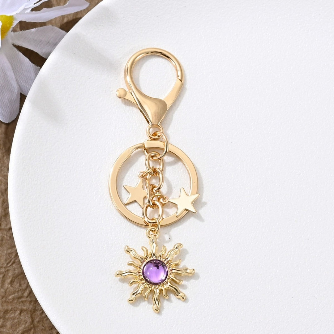 Keychain with Sparkling Sun Motif Kalsten