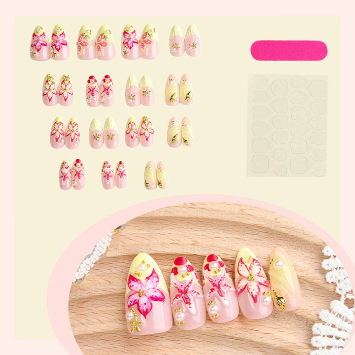 Artificial nail set with delicate floral decorations and glitter accents Kalsten