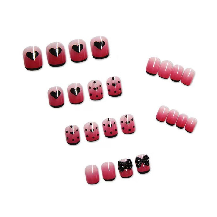 Themed Press-On Nail Set with Decorative Heart and Bow Designs
