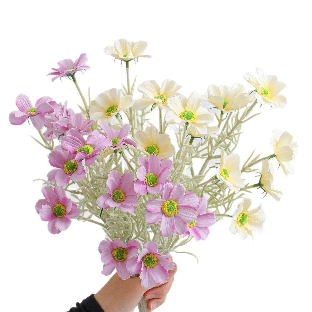 Elegant artificial flower bouquet with intricately detailed blooms