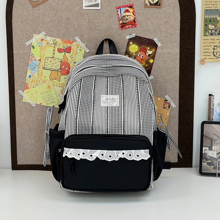 Stylish Striped Backpack with Decorative Accents Kalsten