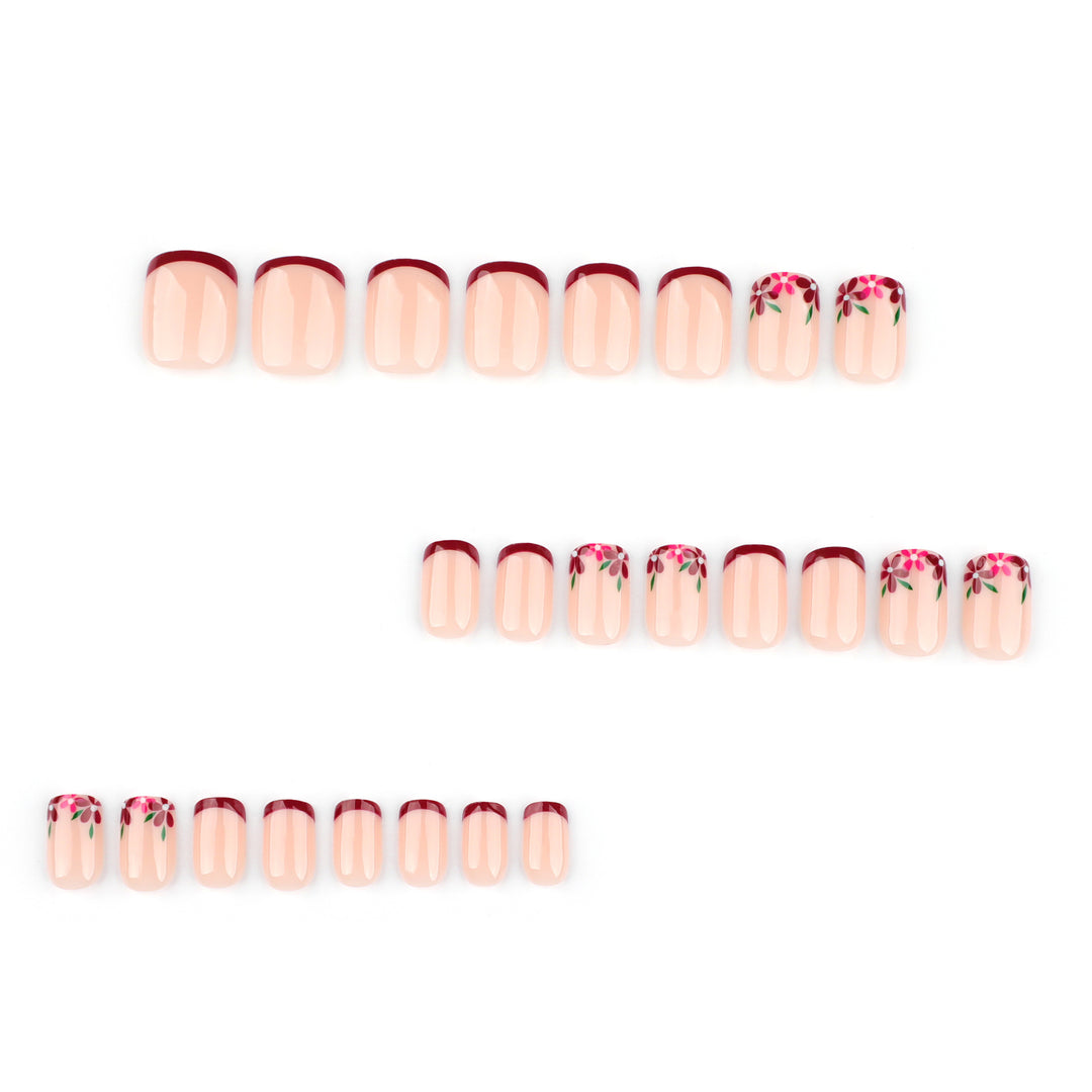 Artful nail design with flower and gradient effects Kalsten