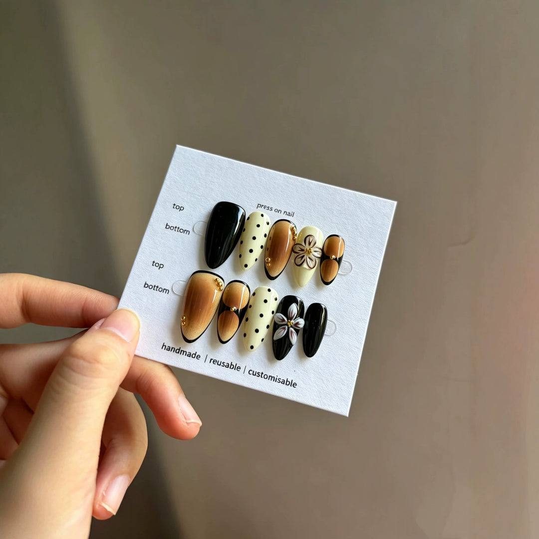 Artistic Press-On Nail Set with Reusable Floral and Polka Dot Designs