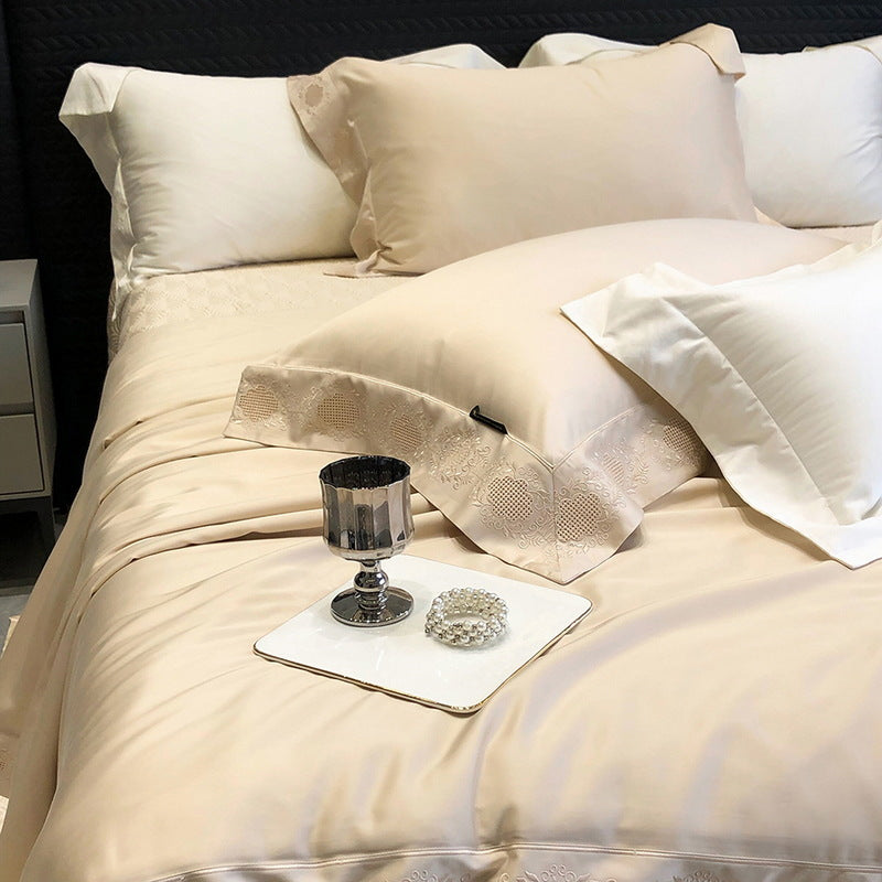 High-gloss satin bed linen set with floral cutwork embroidery border