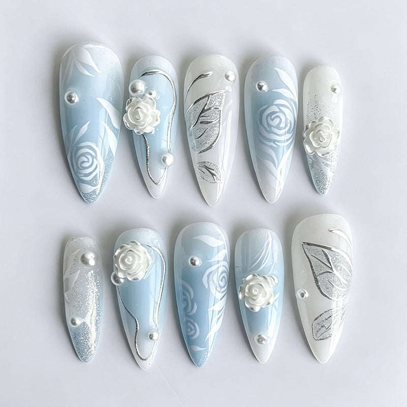 Artificial nail set with elegant floral motifs and glitter effects Kalsten