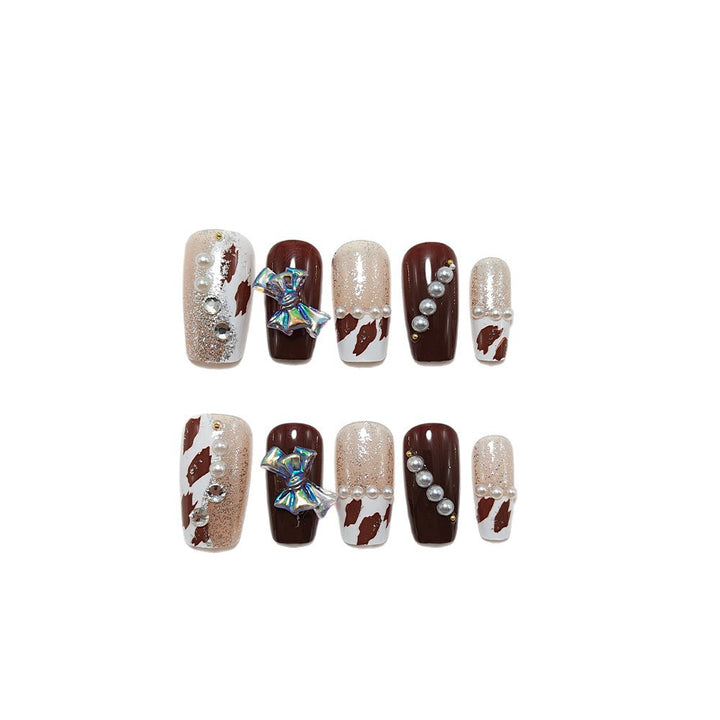 Artificial nails with glamorous 3D applications and glitter Kalsten
