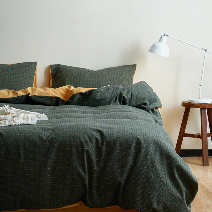 Reversible bed linen set made of breathable cotton blend with fine dot texture