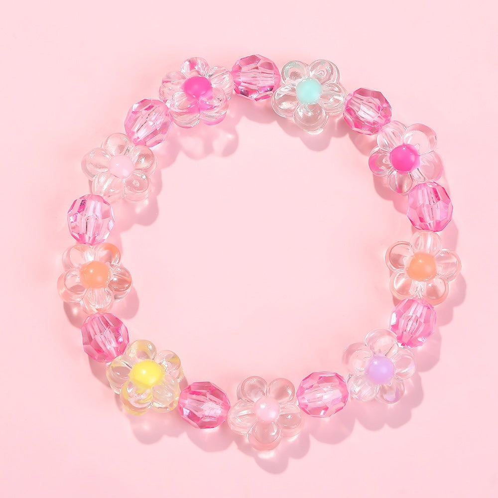 Friendship bracelet with colorful flower motifs Kalsten