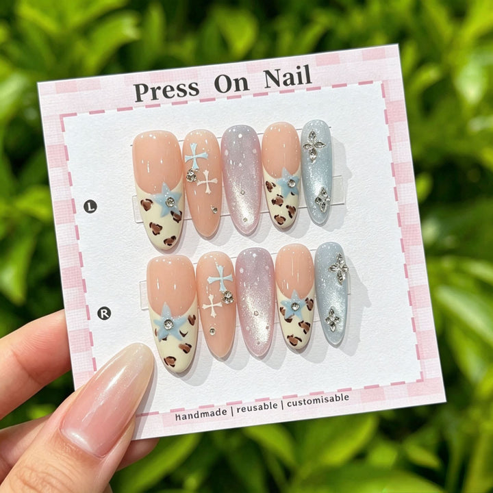 Artistic Press-On Nail Art Set with Cute Character and Bow Accents