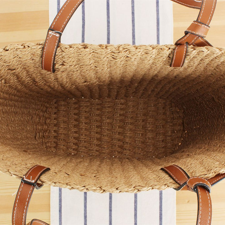 Beach bag made of handwoven natural material with sturdy leather straps Kalsten