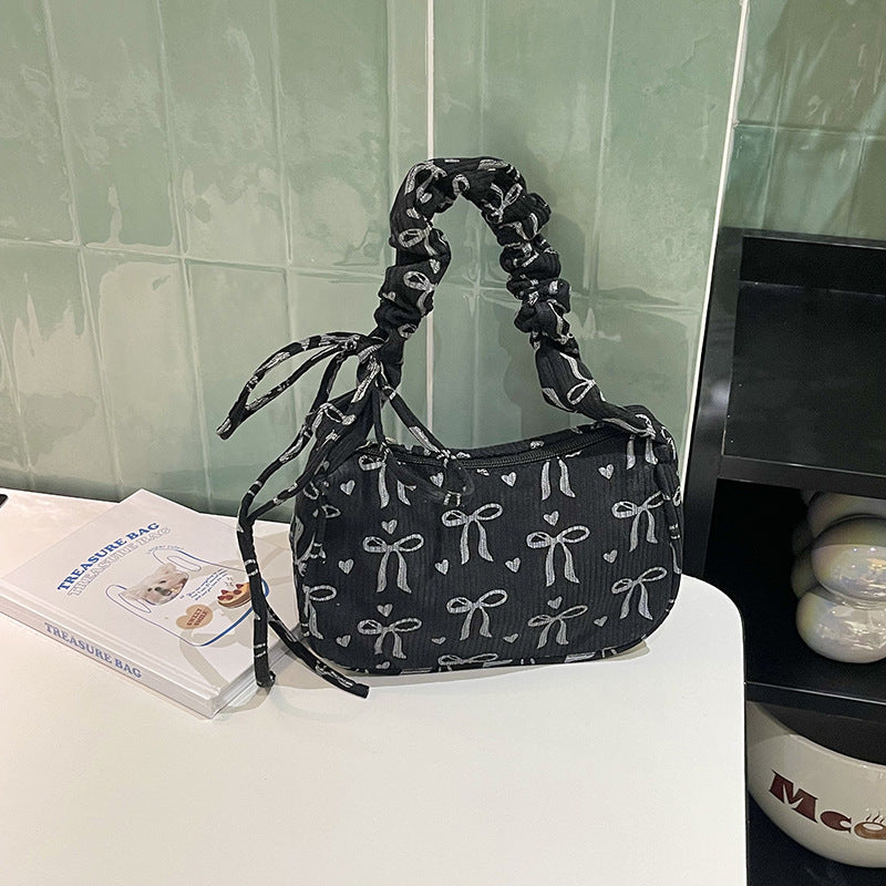 Playful Bow-Print Shoulder Bag