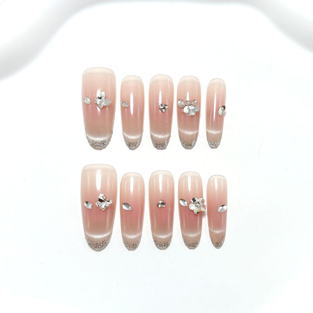 Glamorous artificial nails with glitter decorations Kalsten