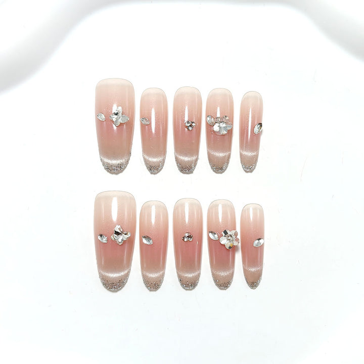 Glamorous artificial nails with glitter decorations Kalsten